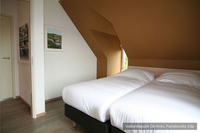 Gezellige slaapkamer in Familievilla 10 persoons, De Cocksdorp, Texel.