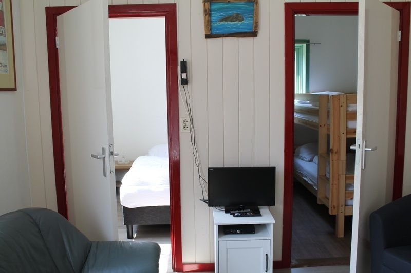 Familienzimmer mit Etagenbett in Onder de vuurtoren 115, De Cocksdorp, Texel fuer zusaetzliche Gaeste.