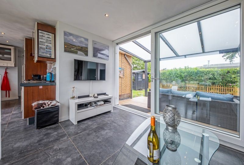 Interior space of Bungalow Duin aan Zee Texel, Bungalowpark Tamarisk, with access to terrace in De Cocksdorp.