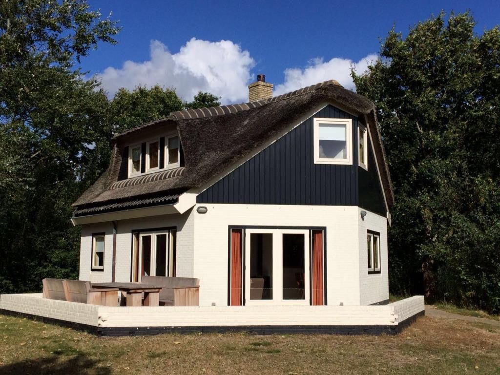 Charmant Velduil vakantiehuis in De Cocksdorp, Texel met ruime veranda.