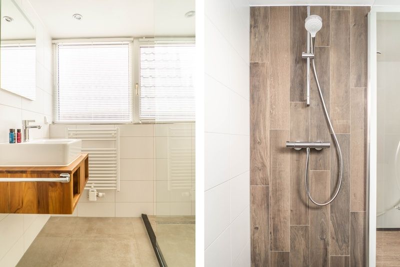 Spacious bathroom with shower and sink in vacation home Type D Kikkertstraat, De Cocksdorp, Texel, for luxurious comfort.