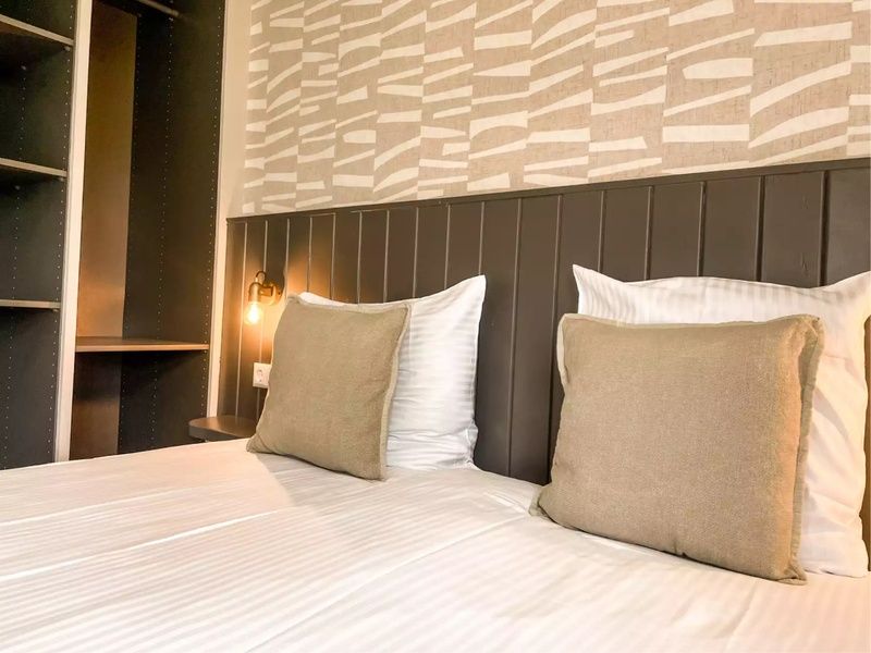 Gemuetliches Schlafzimmer mit Nachtbeleuchtung im Ferienhaus Hogezandskil, De Cocksdorp, Texel fuer einen entspannten Aufenthalt.