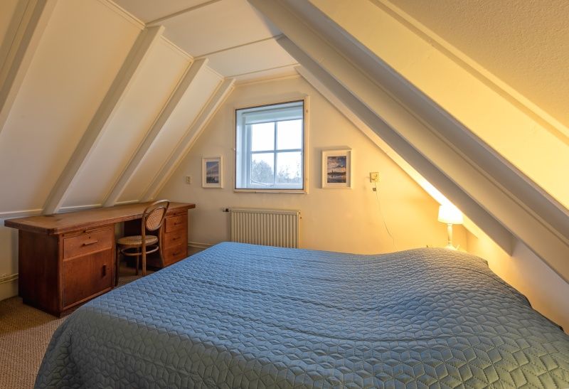 Cozy bedroom in Het Wulpenlied vacation home, De Cocksdorp, Texel.