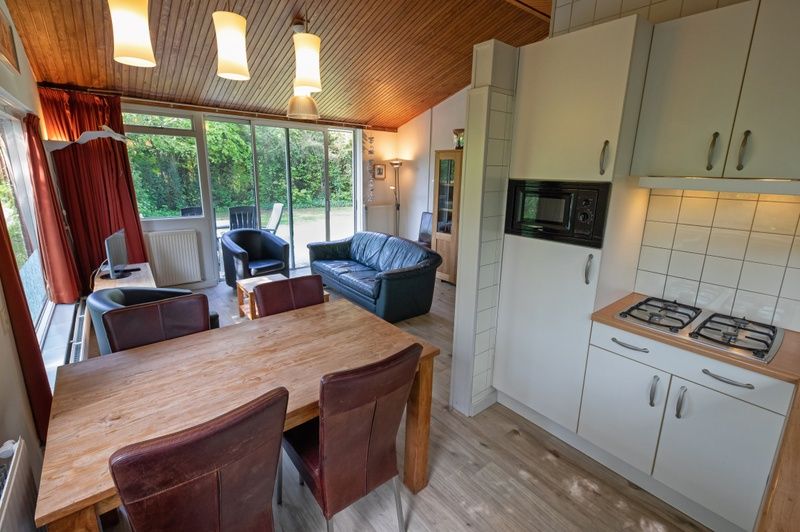 Moderne Kueche und Essbereich im Ferienhaus Slufterduin 128, De Cocksdorp, Texel.