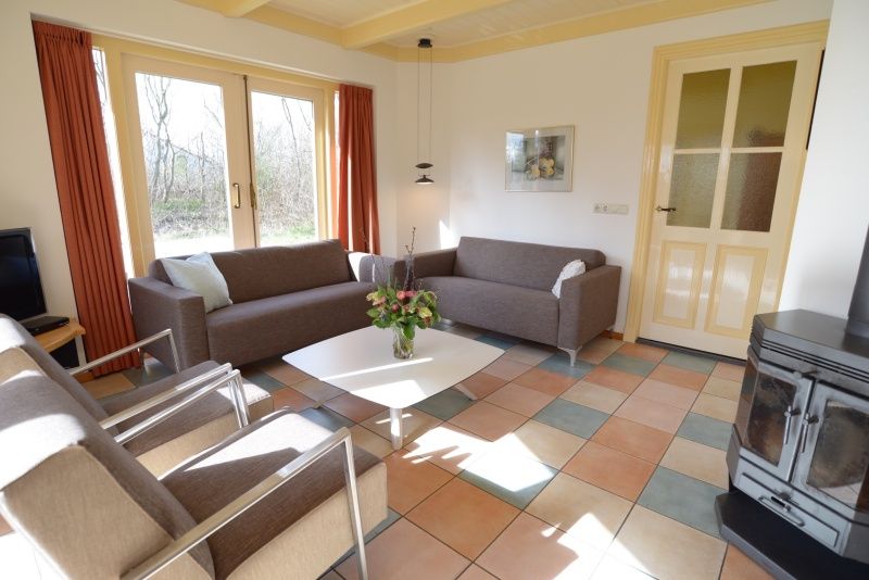 Gemuetliches Wohnzimmer des Ferienhauses De Velduil in De Cocksdorp Texel