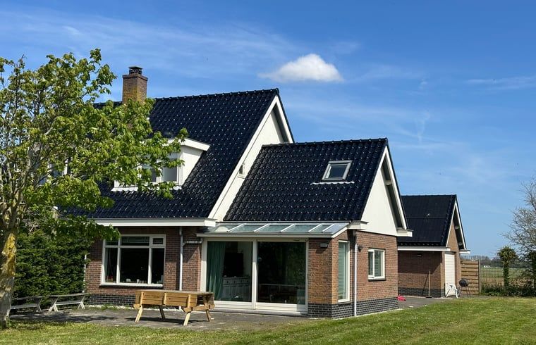 Front facade of Holiday cottage in De Cocksdorp, Texel, Wadden Islands with modern architecture.