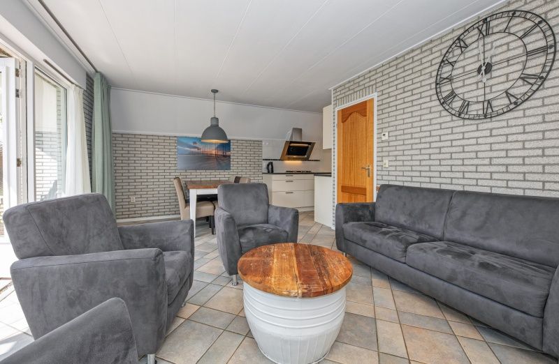 Comfortable sitting area in Holiday home Schelpenoord 121, De Cocksdorp Texel, ideal for relaxation.