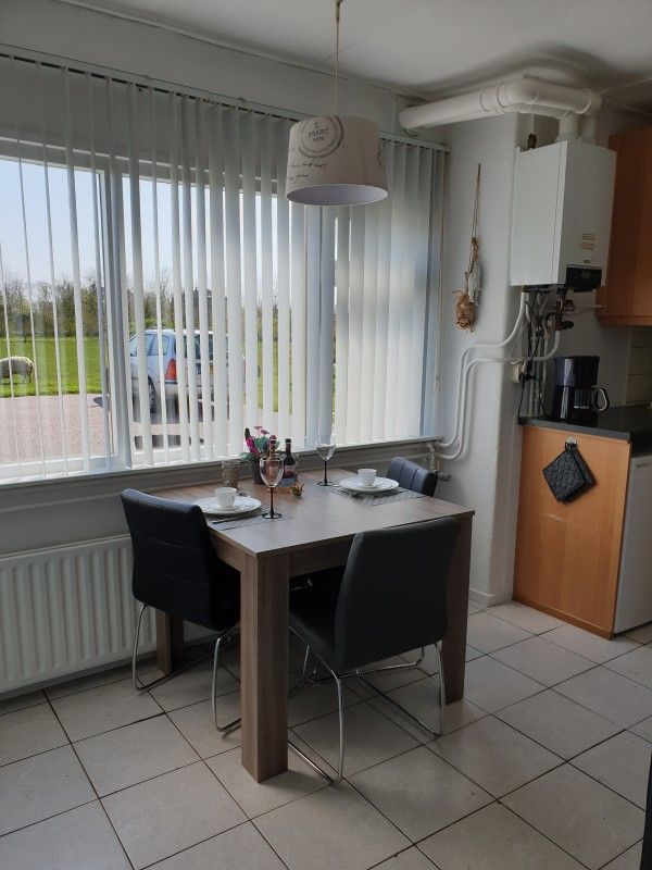 Dining area with a view in Holiday Homes Family Bouthoorn, South Eierland, Texel.