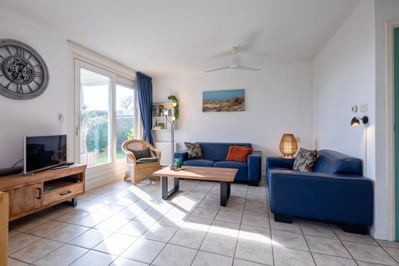 Gezellige woonkamer in Vakantiehuis Slufterduin 52a, De Cocksdorp, Texel met comfortabele zithoek.