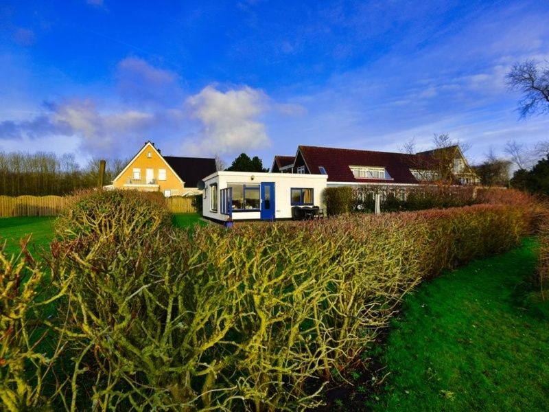 Bungalow 9300 in De Cocksdorp, Texel, umgeben von Natur, ideales Ferienhaus auf den Watteninseln.