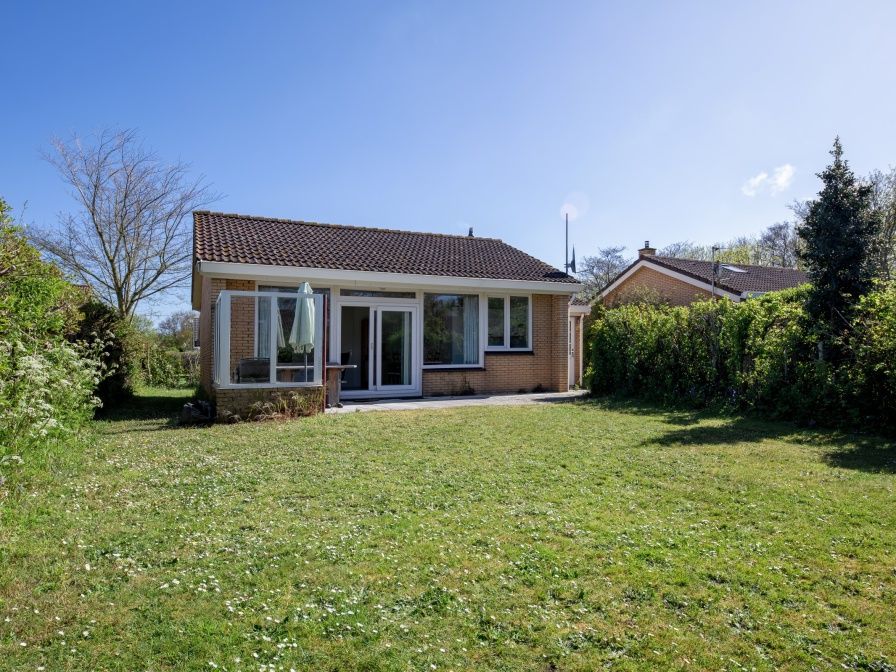Ferienhaus Slufterhoek 078 in De Cocksdorp, Texel mit grossem Garten und sonniger Terrasse.