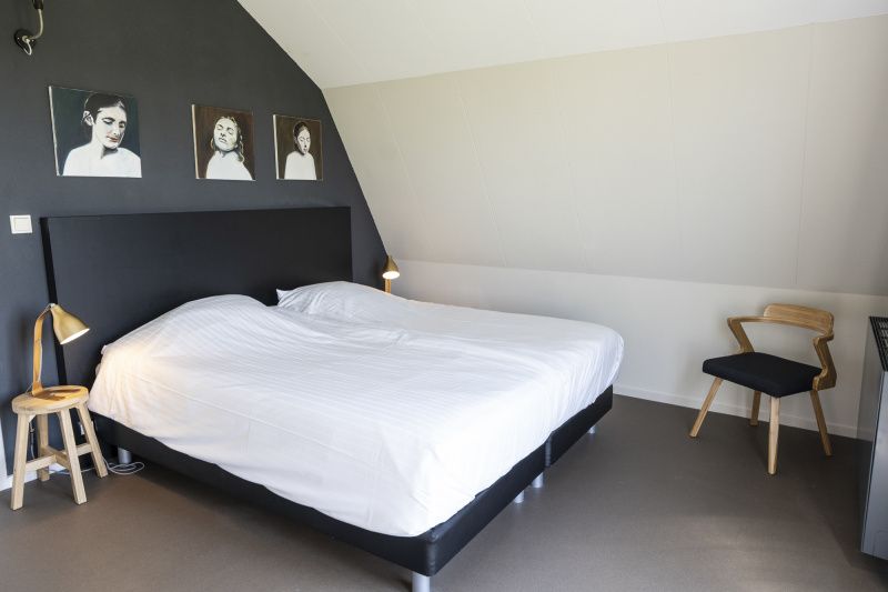 Comfortable bedroom in vacation home Frederik and Lodevika, De Cocksdorp, Texel.