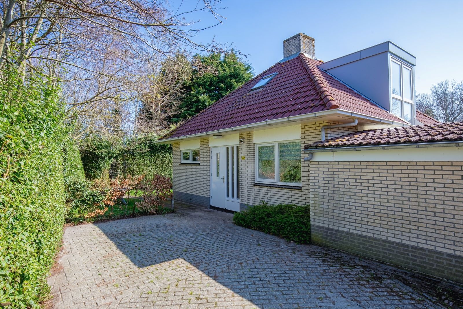 Eingangstuer von Bungalowpark Slufterduin - 't Oppertje, einem einladenden Ferienhaus in De Cocksdorp, Texel.