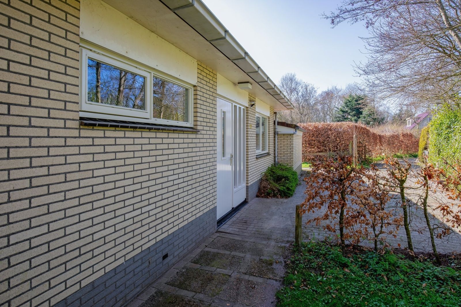 Seitenansicht von Bungalowpark Slufterduin - 't Oppertje, ein Ferienhaus in De Cocksdorp, Texel, mit gruener Umrandung.