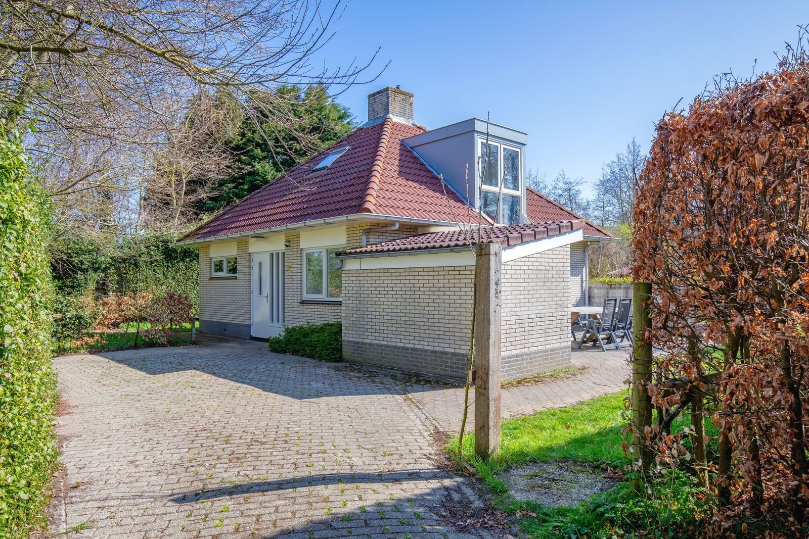 Parkplatz und Zugang zum Bungalowpark Slufterduin - 't Oppertje, ein Ferienhaus in De Cocksdorp, Texel.