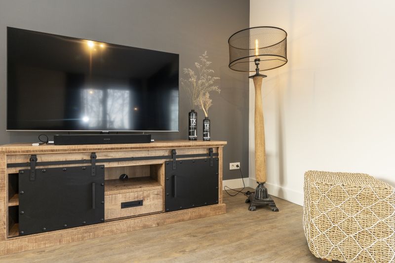 Stilvolle TV-Ecke im Ferienhaus Duinoord Texel, gelegen in De Cocksdorp auf Texel.
