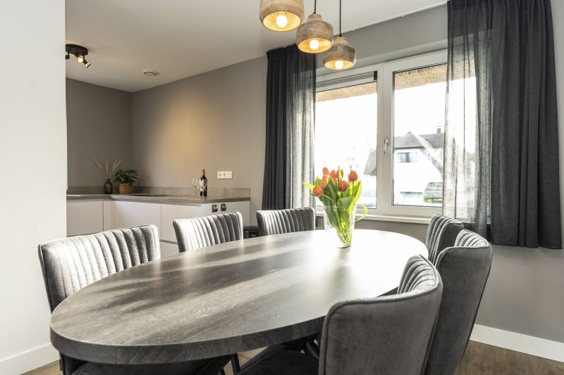 Esszimmer mit Aussicht im Ferienhaus Duinoord Texel, De Cocksdorp, Waddeninseln.