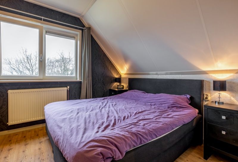 Gemuetliches Schlafzimmer in Tongelen R.D. van, Ferienhaus in De Cocksdorp, Texel. Perfekt fuer einen erholsamen Schlaf.