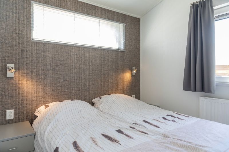 Attractive bedroom in Chalet Bregkoog 231, De Koog, Texel with double bed on Chaletpark Bregkoog.