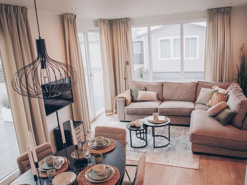 Cozy living room of Chalet Bregkoog 119 on Texel, perfect for relaxation in De Koog, Wadden Islands.