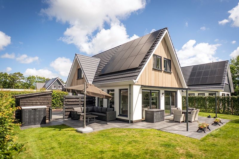 Villa 41 in De Koog, Texel, with terrace and garden, ideal vacation home for a relaxing stay.
