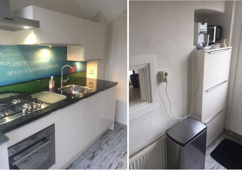 Fully equipped kitchen in De Duinputter vacation home De Koog Texel with modern appliances.