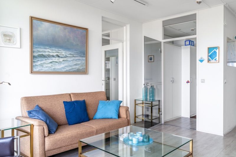 Stylish seating area in Apartment Juliana 160 Zeezicht, a vacation home in De Koog, Texel, featuring coastal decoration.
