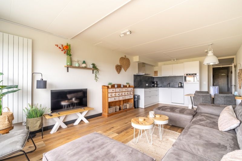 Cozy indoor area with kitchen in Apartment Juliana 086, De Koog, Texel.
