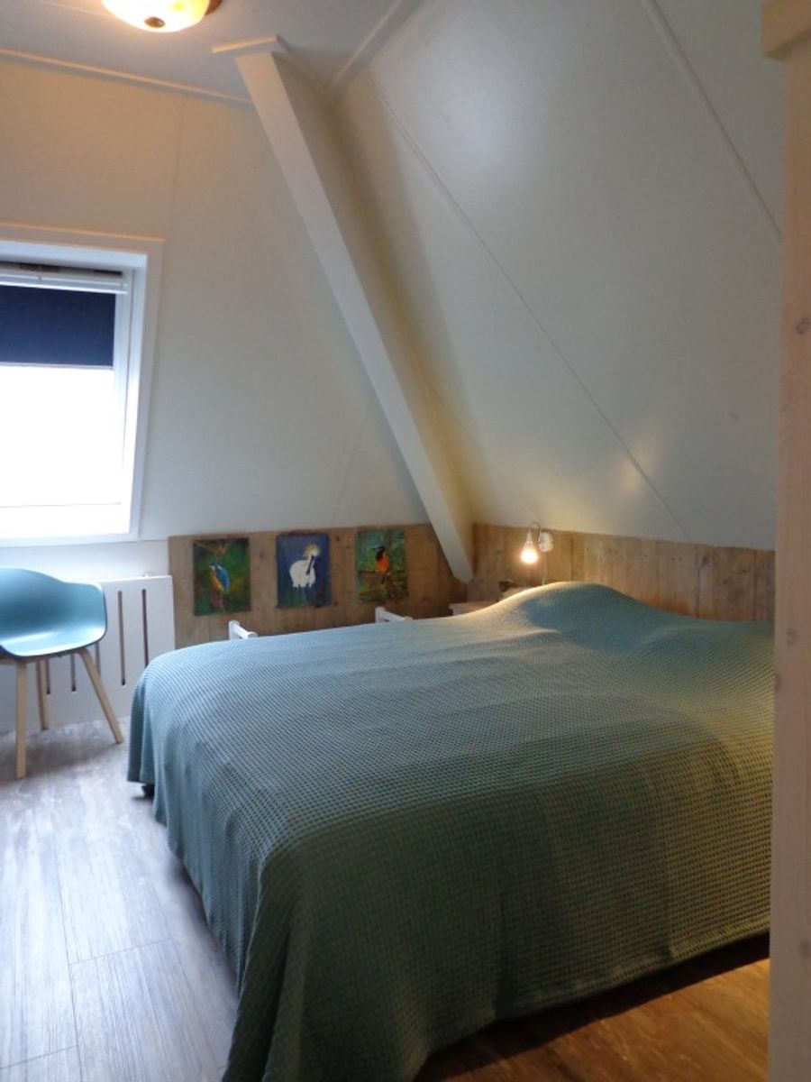 Cozy bedroom with skylight in Residence California - Geborchenheit - 361, vacation home De Koog, Texel.