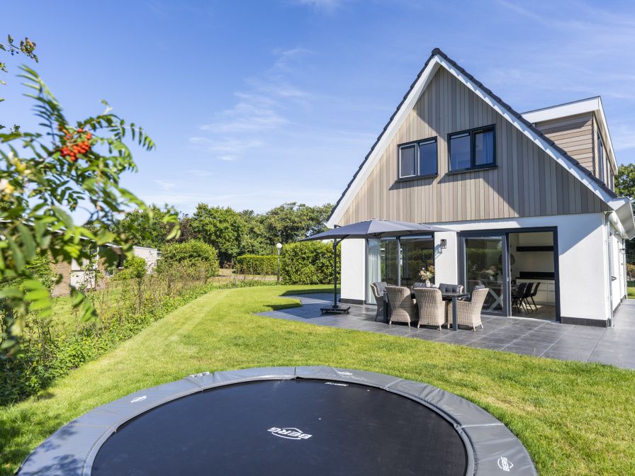 Villa 35a in De Koog, Texel with sunny terrace and trampoline in the garden.