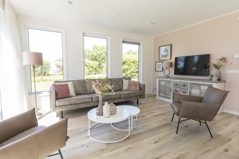 Stylish living room in Villa 35a, De Koog, Texel with lots of natural light.