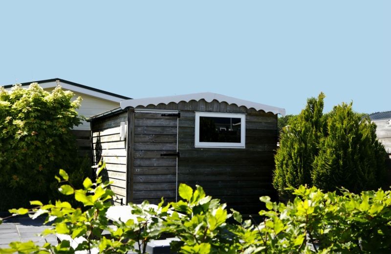 Barn at Chalet Bregkoog 227, Chaletpark Bregkoog, De Koog, Texel surrounded by green nature.