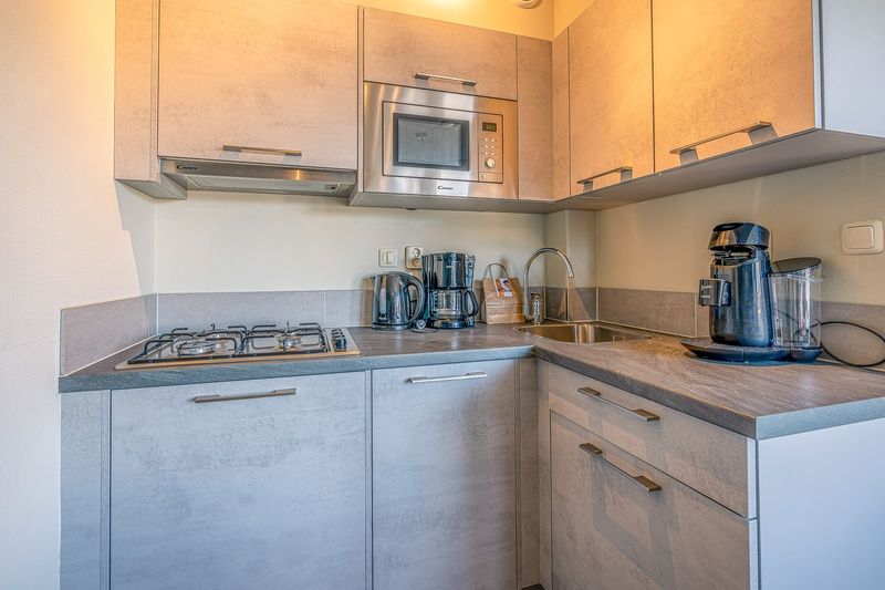 Bright bedroom in Apartment Zeedistel 22, De Koog, Texel with double bed and window with view.