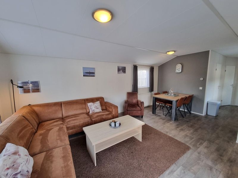 Dining room with stylish decor in Chaletpark Bregkoog - Chalet Bregkoog 235, De Koog, Texel for cozy meals.