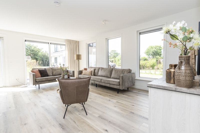 Bright living room of Villa 21A in De Koog, Texel, vacation home with stylish decor on the Wadden Islands.