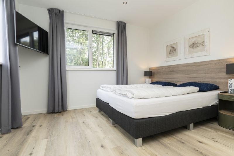 Comfortable bedroom in Villa 21A, De Koog, Texel, perfect vacation home on the Wadden Islands.