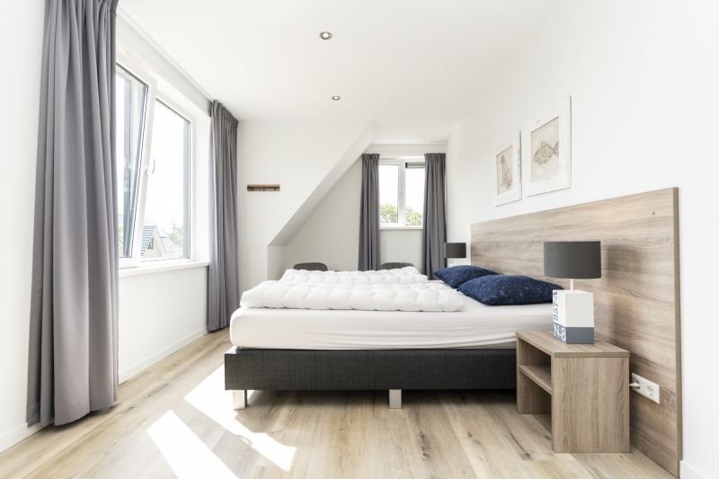 Spacious bedroom with lots of light in Villa 21A, De Koog, Texel, vacation home on the Wadden Islands.
