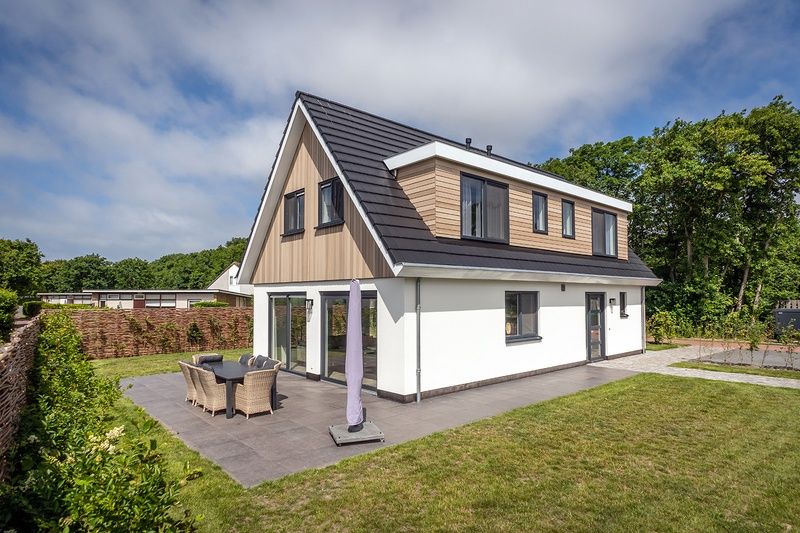 Exterior of Villa 21A, De Koog, Texel, modern vacation home with garden on the Wadden Islands.