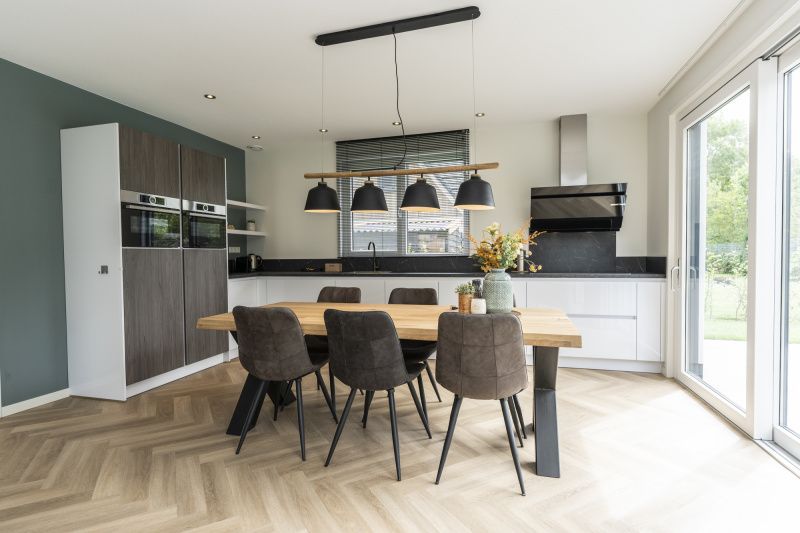 Stylish kitchen in Villa 39, De Koog, Texel. Luxury vacation home with modern amenities on the Wadden Islands.