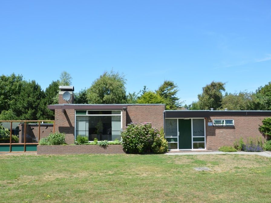 Vacation home Orchismient 28 in De Koog Texel with spacious garden and green surroundings.