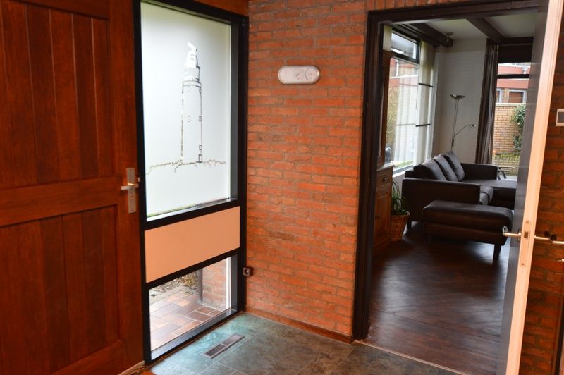 Entrance to vacation home Orchismient 28 De Koog Texel with atmospheric entry.