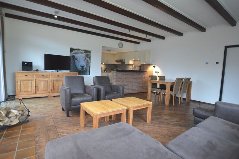 Open living space in Orchismient 28 De Koog Texel with modern furnishings.