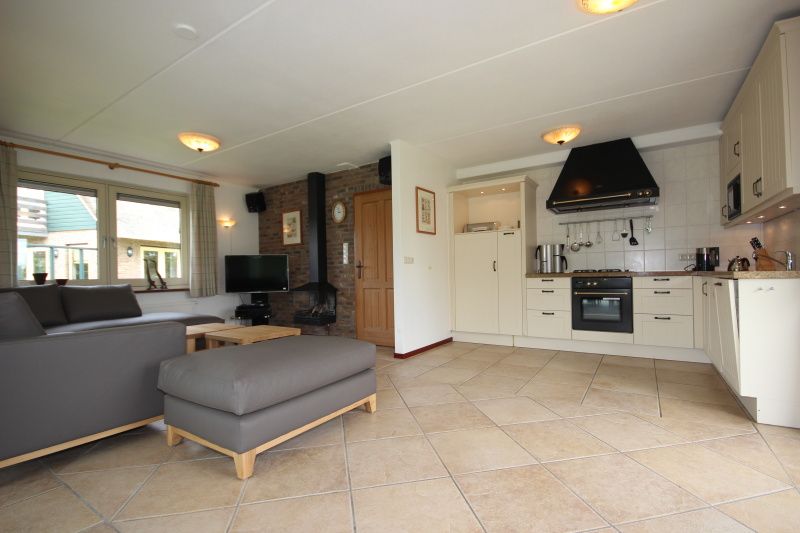 Modern kitchen in Villa with Greenhouse, vacation home in De Koog, Wadden Islands.