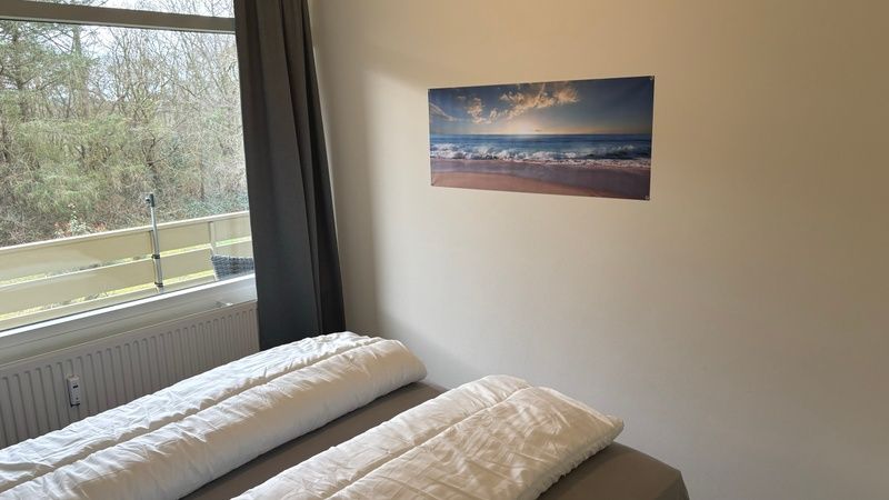 Second bedroom in Apartment Kerckeland 40, De Koog, Texel with serene atmosphere.