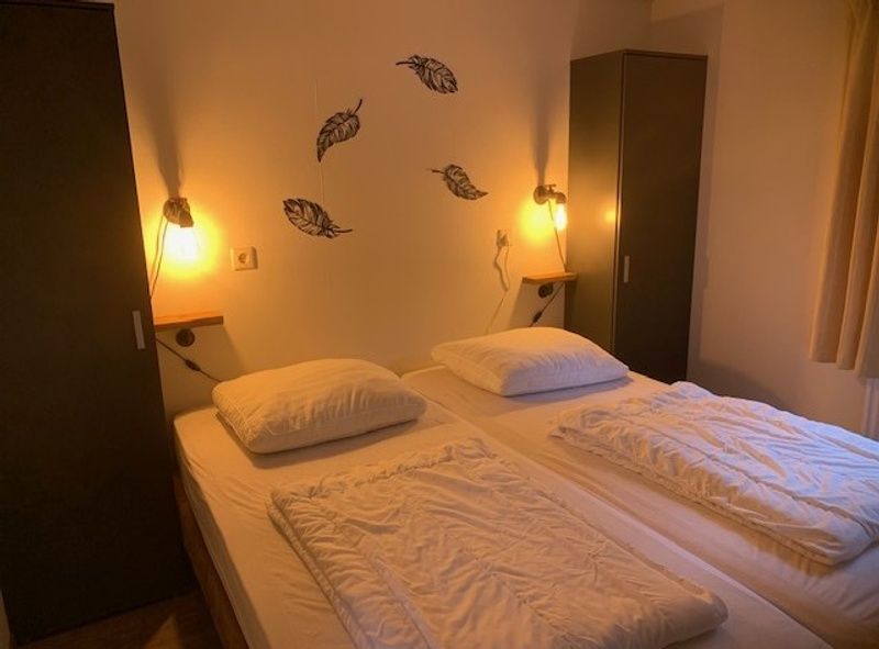 Cozy bedroom with double bed Chalet Bregkoog 203 in De Koog, Texel.