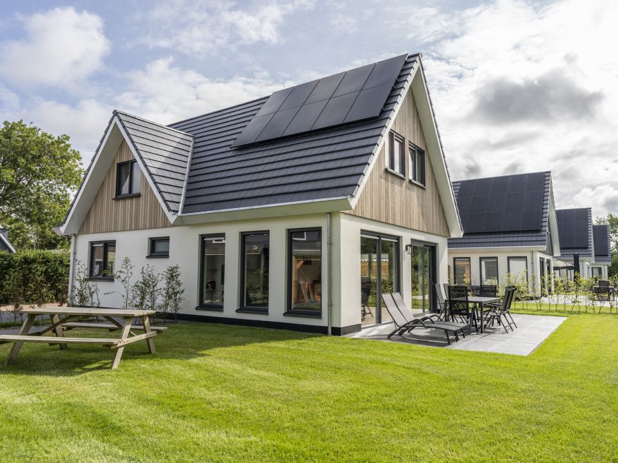 Villa 37 in De Koog, Texel, with spacious garden and terrace. Perfect vacation home on the Wadden Islands.