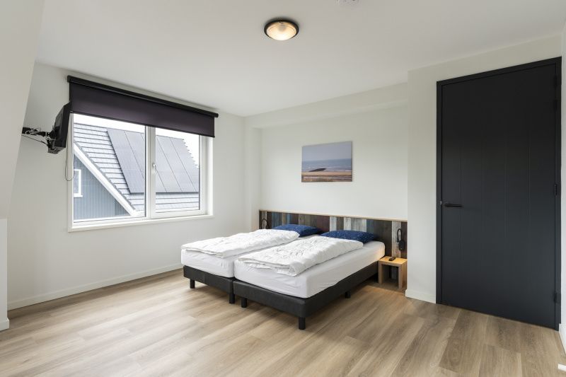 Second bedroom in Villa 37, De Koog, Texel. Spacious vacation home on the Wadden Islands.