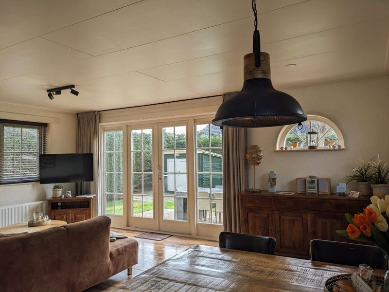 Bright living space in D' Duinster vacation home, De Koog, Texel overlooking garden on the Wadden Islands.