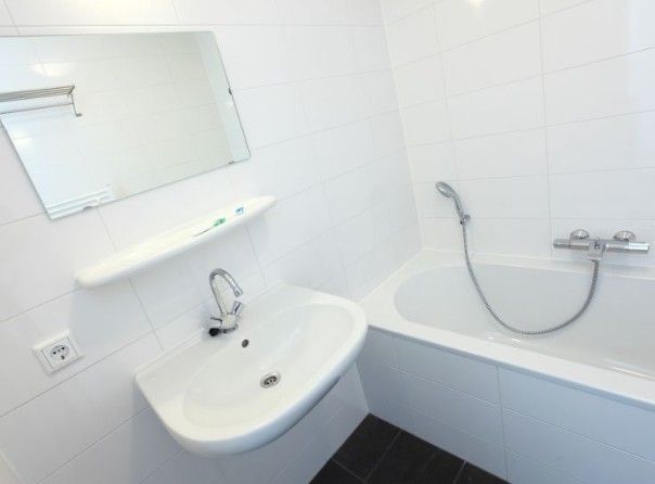 Stylish bathroom in Kustpark houses, De Koog, Texel, with modern amenities for a comfortable stay on the Wadden Islands.
