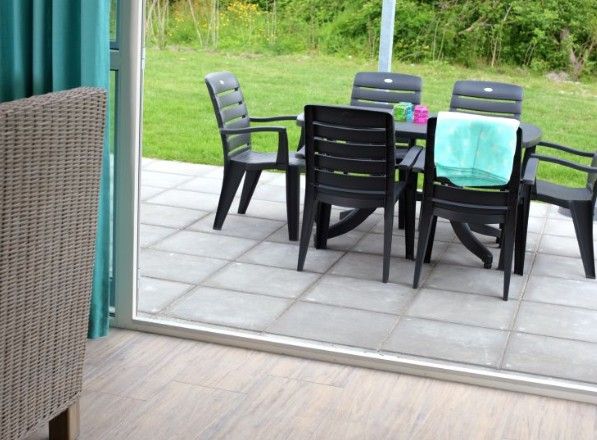 Terrace with garden furniture at Kustpark houses in De Koog, Texel, ideal for outdoor relaxation on the Wadden Islands.